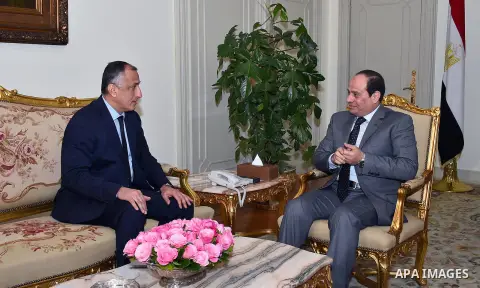 Egyptian President Abdel Fattah al-Sisi meets with Tareq Amer governor of the Central Bank, in Cairo, Egypt on Dec. 29, 2015. Photo by Egyptian President Office