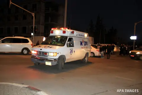 Israeli forensic police investigate the site of an attack near Jerusalem's light rail train service on January 4, 2016, after a Palestinian tried to stab security forces, police said. A 15-year-old Israeli girl was light...