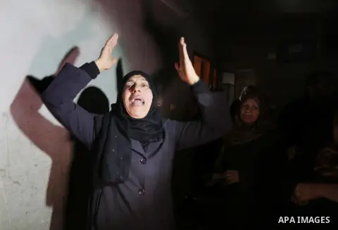 Relatives of Palestinian Mussa Zeater, who was killed in an attack by an Israeli aircraft, mourn during his funeral in the northern Gaza Strip January 13, 2016. The Israeli aircraft attacked a group of Palestinians in th...