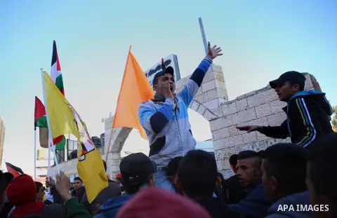 Palestinian Relatives of Mustafa al-Khatib,17, who Israeli military said was shot dead by Israeli soldiers after he tried to stab a soldier on 12 October, mourn during his funeral in the West Bank city of Ramallah, on Ja...