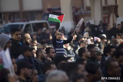 Palestinians gather at the Qatari-funded Hamad City housing complex in Khan Younis, southern Gaza Strip, Saturday, Jan. 16, 2016. More than 1,000 Palestinian families have taken possession of new apartments in the first...