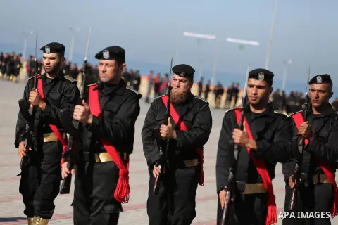 Palestinian members of officers display their skills during a graduation ceremony, in Gaza city on January 17, 2016. Photo by Mohammed Asad