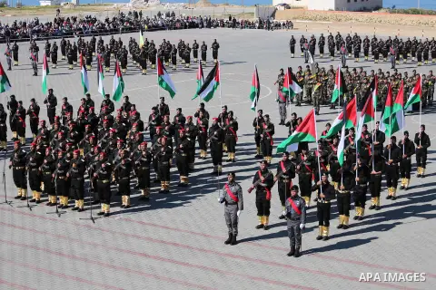 Palestinian members of officers display their skills during a graduation ceremony, in Gaza city on January 17, 2016. Photo by Mohammed Asad