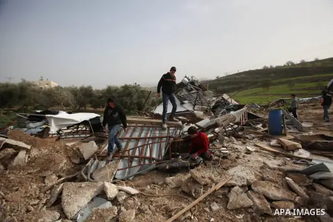 Palestinians inspect the rubble of a farm that was demolished after Israeli authorities said it was built without a permit on January 18, 2016 in the West Bank village al-Fundoq east of the village of Qalqiliya. Photo by...