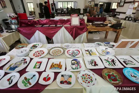 A picture shows antiques of ceramics which made by Palestinians disabled during a project titled "Erada" funded by the Turkish President Ragab Ardogan at the Islamic university, in Gaza City, on January 20, 2016. Photo b...