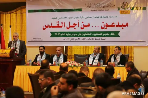 Senior Hamas leader Ismail Haniyeh speaks during a ceremony to honor the journalists, in Gaza city on January 23, 2016. Photo by Mohammed Asad