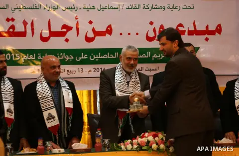 Senior Hamas leader Ismail Haniyeh speaks during a ceremony to honor the journalists, in Gaza city on January 23, 2016. Photo by Mohammed Asad