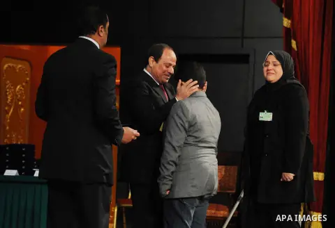 Egyptian President Abdel-Fattah el-Sissi takes part in a ceremony marking Police Day, which falls on Jan. 25, the anniversary of the 2011 uprising that toppled longtime ruler Hosni Mubarak, in Cairo, Egypt, Saturday, Jan...
