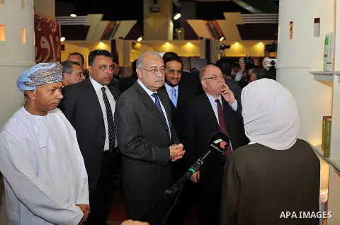 Egyptian Prime Minister Sherif Ismail opens the Cairo International Book Fair, in Cairo, Egypt, on Jan. 27, 2016. Photo by Stranger