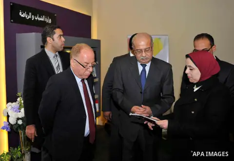 Egyptian Prime Minister Sherif Ismail opens the Cairo International Book Fair, in Cairo, Egypt, on Jan. 27, 2016. Photo by Stranger