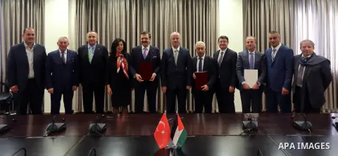 Palestinian Prime Minister Rami Hamdallah meets with President of the Union of Turkish Chambers of Commerce Refaat Oglo, in the West Bank city of Ramallah on Jan. 31, 2016. Photo by Prime Minister Office
