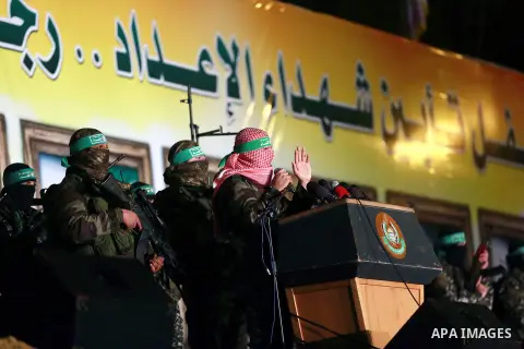 Spokesman of al-Qassam Brigades, the military wing of Hamas movement, Abu Obeida speaks during a gathering to pay tribute to the brigade's militants who died after a tunnel collapsed in the Gaza Strip on January 31, 2016...