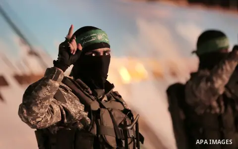 Palestinian members of the Ezzedine al-Qassam Brigades, the armed wing of the Hamas movement, take part in a gathering on January 31, 2016 in Gaza city to pay tribute to their fellow militants who died after a tunnel col...