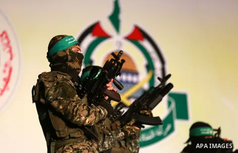 Palestinian members of the Ezzedine al-Qassam Brigades, the armed wing of the Hamas movement, take part in a gathering on January 31, 2016 in Gaza city to pay tribute to their fellow militants who died after a tunnel col...