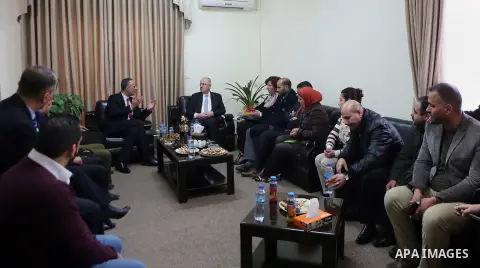 Palestinian Prime Minister Rami Hamdallah visits the headquarter of ministry of Justice in the West Bank city of Ramallah on Feb. 01, 2016. Photo by Prime Minister Office