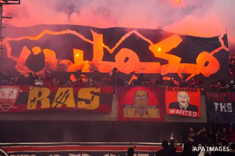 Al Ahly fans, also known as "Ultras", light flares and shout slogans at al-Ahly club's training stadium marking the fourt anniversary of killing al-Ahly fans in what known as the "Port Said massacre", on February 1, 2016...
