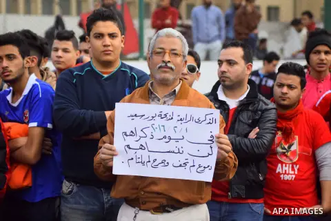 Relatives of al-Ahly fans, who were killed in what known as the "Port Said massacre", attend the fourth anniversary of killing their relatives at al-Ahly club's training stadium, on February 1, 2016. On 1 February 2012,...
