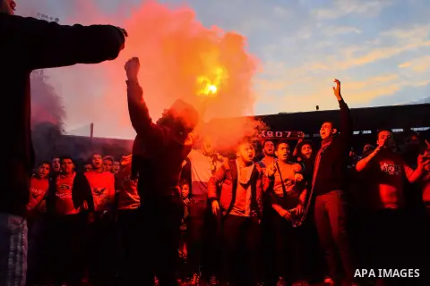 Al Ahly fans, also known as "Ultras", light flares and shout slogans at al-Ahly club's training stadium marking the fourt anniversary of killing al-Ahly fans in what known as the "Port Said massacre", on February 1, 2016...