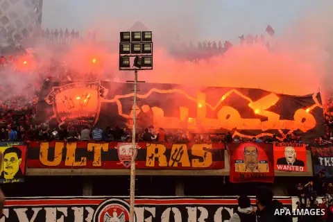 Al Ahly fans, also known as "Ultras", light flares and shout slogans at al-Ahly club's training stadium marking the fourt anniversary of killing al-Ahly fans in what known as the "Port Said massacre", on February 1, 2016...