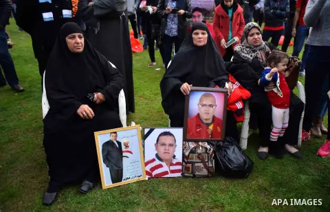 Relatives of al-Ahly fans, who were killed in what known as the "Port Said massacre", attend the fourth anniversary of killing their relatives at al-Ahly club's training stadium, on February 1, 2016. On 1 February 2012,...