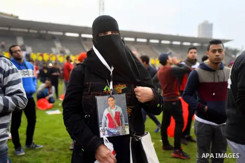 Relatives of al-Ahly fans, who were killed in what known as the "Port Said massacre", attend the fourth anniversary of killing their relatives at al-Ahly club's training stadium, on February 1, 2016. On 1 February 2012,...