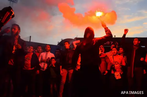 Al Ahly fans, also known as "Ultras", light flares and shout slogans at al-Ahly club's training stadium marking the fourt anniversary of killing al-Ahly fans in what known as the "Port Said massacre", on February 1, 2016...