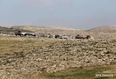 A general view shows the village of Khirbet Jenbah after several homes were demolished by Israeli bulldozers in a disputed military zone in the area of Musafir Jenbah, which includes several villages, south of the West B...