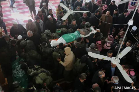 Palestinian militants carry the body of their comrade Ahmed al-Zahar, who was killed when a tunnel collapse on Tuesday, during his funeral in the village of Al-Moghraga near central Gaza Strip, February 3, 2016. The coll...