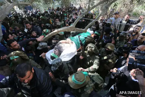 Palestinian militants carry the body of their comrade Ahmed al-Zahar, who was killed when a tunnel collapse on Tuesday, during his funeral in the village of Al-Moghraga near central Gaza Strip, February 3, 2016. The coll...