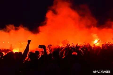 Al-Zamalek soccer club fans known as 'Ultras White Knights" light flares and shout slogans to mark the first anniversary of killing al-Zamalek fans in Cairo, Egypt, Feb. 08, 2016. At least 22 soccer fans were crushed to...