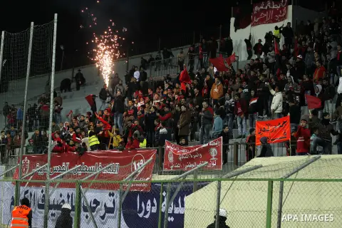 Fans attend the crucial AFC Champions League Playoff phase football match between Palestinian's Ahly Al-Khalil football team and FC Khujand team at Dura Stadium in the West Bank city of Hebron on Feb. 09, 2016. Mahmoud W...