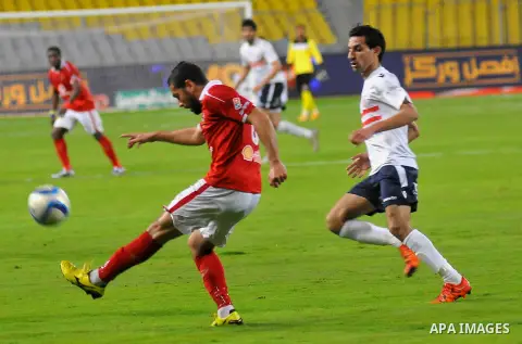 Al Ahly players compete against with Zamalek players during their Egyptian Premier League derby soccer match at Borg El Arab "Army Stadium" near Alexandria, Egypt, February 9, 2016. Photo by Amr Sayed