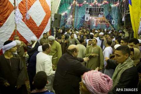 Egyptians celebrate Moulid al-Hussein, a Sufi gathering which commemorates the birth of the Muslim Prophet Muhammad's grandson, in Cairo, Egypt. The event attracts thousands of Muslims from all over the country to the mo...