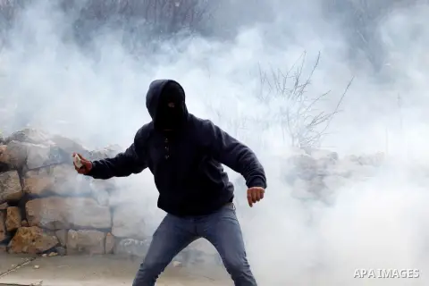 Palestinian protesters clash with Israeli security forces following the funeral of Omar Jawabra, who was killed by Israeli fire during clashes near hebron the day before, at al-Aroub Palestinian refugee camp, north the W...