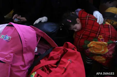 Palestinians await permission to enter Egypt as they gather at the Rafah border crossing in the southern Gaza Strip on February 13, 2016. The Gaza Strip's border crossing with Egypt at Rafah is set to reopen for two days...