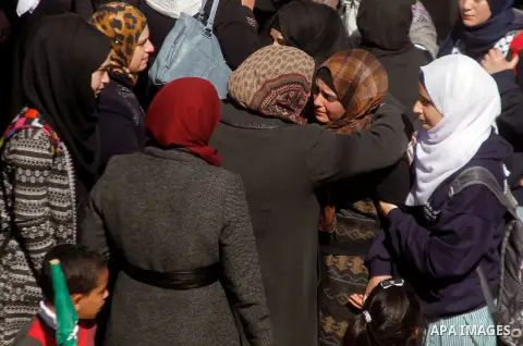 The relatives of Palestinian Kalzar al-Uweiwi, a Palestinian teenager who was killed a day earlier following a reported stabbing attack, mourn during her funeral, in the West Bank city of Hebron, February 14, 2016. Israe...