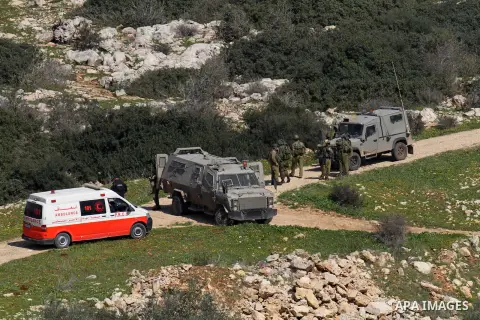 Israeli security forces inspect the area where two Palestinian teenagers were shot dead by security forces as they reported fired on Israeli soldiers on February 14, 2016 in the village of Araka, West of Jenin in the Isr...