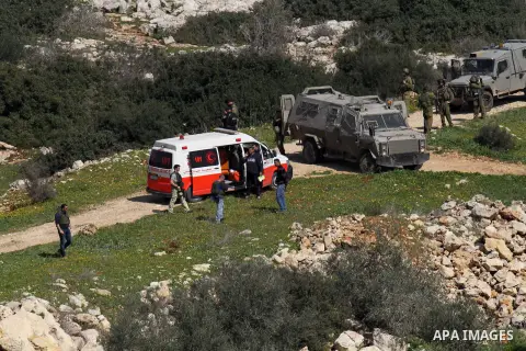 Israeli security forces inspect the area where two Palestinian teenagers were shot dead by security forces as they reported fired on Israeli soldiers on February 14, 2016 in the village of Araka, West of Jenin in the Isr...