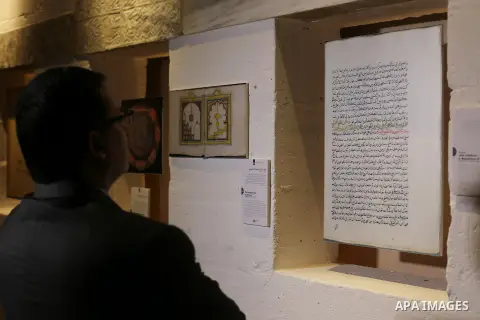Ambassador of the Netherlands in Palestine, Peter Muleman, attends the Islamic art gallery organized by the Dutch embassy in Gaza city on Feb. 16, 2016. Photo by Mohammed Asad