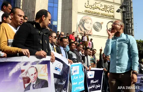 Egyptians take part in a protest to demand jobs in front of the journalists syndicate, in Cairo, Egypt, on February 17, 2016. Photo by Alaa Elkassas