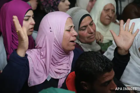 Relatives of Abed Hammad, 20, who was shot dead by Israeli forces, mourn during his funeral in the West Bank village of Silwad, Feb. 20, 2016. Hammad was one of three Palestinians to be killed by Israeli forces on Friday...