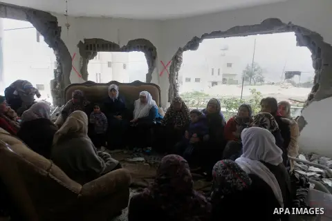 Palestinians check the damage in a house after it was partially demolished by Israeli forces in the West Bank village of Deir Samit, south of Hebron February 23, 2016. Israeli army on Tuesday demolished houses of two Pal...