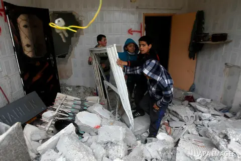 Palestinians check the damage in a house after it was partially demolished by Israeli forces in the West Bank village of Deir Samit, south of Hebron February 23, 2016. Israeli army on Tuesday demolished houses of two Pal...