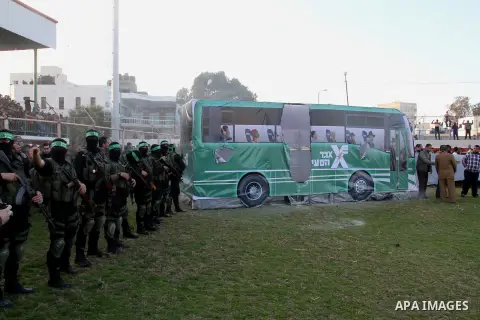 Palestinian militants of the Ezzedine al-Qassam Brigades, the armed wing of the Hamas movement, take part in an anti-Israel rally on February 26, 2016, in the southern Gaza Strip town of Rafah. Photo by Abed Rahim Khatib