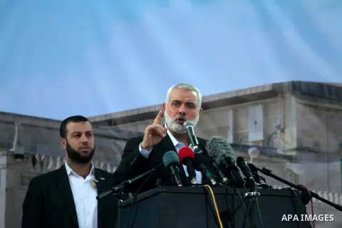 Palestinian islamist movement Hamas' chief, Ismail Haniya speaks during an anti-Israel rally on February 26, 2016, in the southern Gaza Strip town of Rafah. Photo by Abed Rahim Khatib