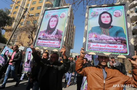 Palestinians take part in a protest demanding release the prisoners in Israeli jails, in Gaza city, on February 29, 2016. Photo by Mohammed Asad