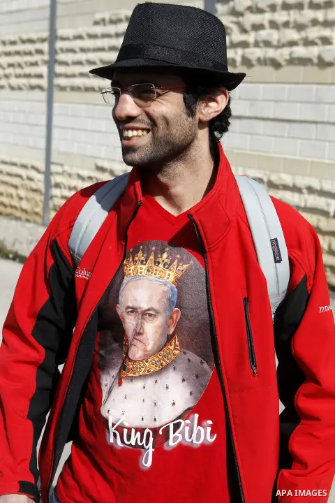 Peace activist take part during a joint Israeli-Palestinian peace march along the Israeli controvertial separation wall in the West Bank city of Beit Jala between Bethlehem and Jerusalem, on March 4, 2016. Peace activist...