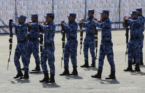 Palestinian members of officers display their skills during a graduation ceremony, in Gaza city, on March 6, 2016. Photo by Mohammed Asad