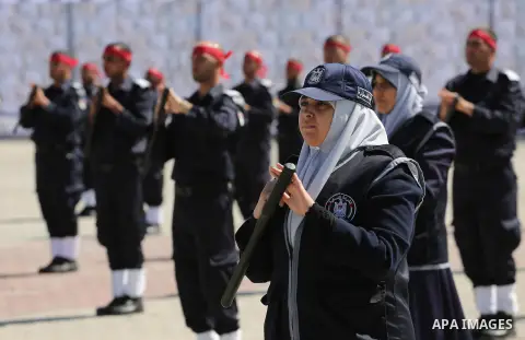 Palestinian members of officers display their skills during a graduation ceremony, in Gaza city, on March 6, 2016. Photo by Mohammed Asad