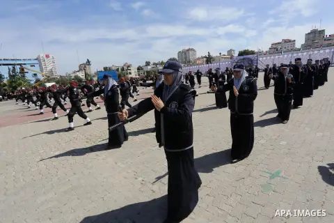 Palestinian members of officers display their skills during a graduation ceremony, in Gaza city, on March 6, 2016. Photo by Mohammed Asad